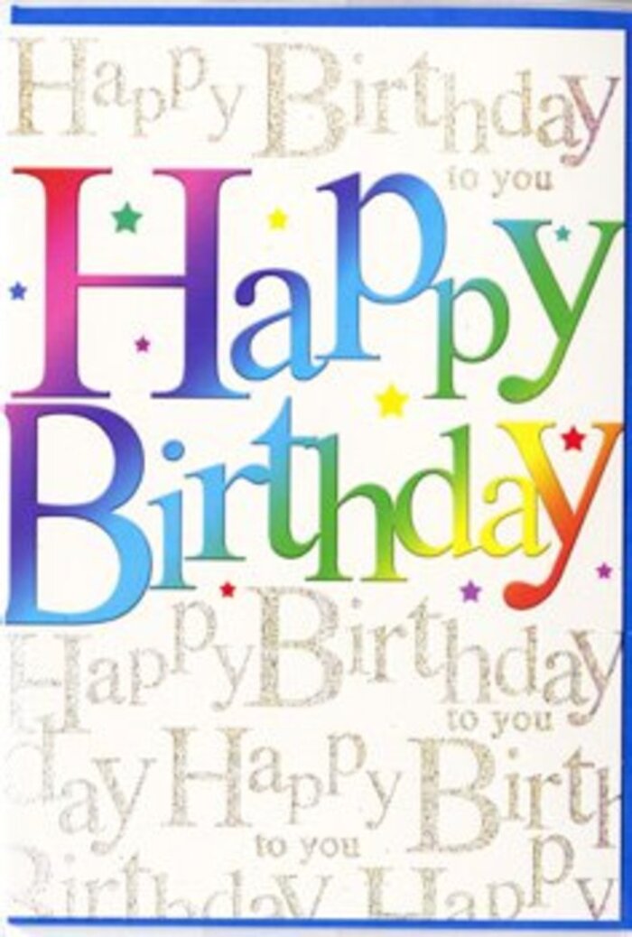 This photograph shows a sophisticated yet playful birthday card, the sort of design you might choose in De Beauvoir Town when you want the card to feel as special as the flowers you're sending. The front is dominated by the phrase Happy Birthday, printed in generously sized letters that run across the card like a cheerful banner. Each letter is filled with a different hue, moving gradually through a full rainbow-from deep ruby and rosy pinks into firey oranges, mellow golds, bright greens, cool blues, and rich violets. The colouring is smooth and velvety, with subtle blending from shade to shade, giving the words a sense of depth and movement, almost like ribbons twisting in the air above a birthday table. Behind this main message, stretching across the entire card face, is a delicate background of golden script. The phrase Happy Birthday to you is written repeatedly in fine, looping handwriting, the lines overlapping gently without becoming too busy. This script appears in a light metallic gold that shimmers softly, reminiscent of fairy lights flickering in a De Beauvoir Town courtyard on a summer evening. The card's base is a creamy off-white, providing a calm canvas that lets both the rainbow letters and the gold script stand out clearly. There are no cartoon characters or heavy graphics-just the harmony between bold, colourful typography and refined, sparkling detail. The style feels modern yet warm, suitable for adults or teens alike, and it pairs beautifully with a bright birthday bouquet, conveying that this is more than a simple greeting; it's a joyful tribute, ready to be delivered with care across the local neighbourhood.