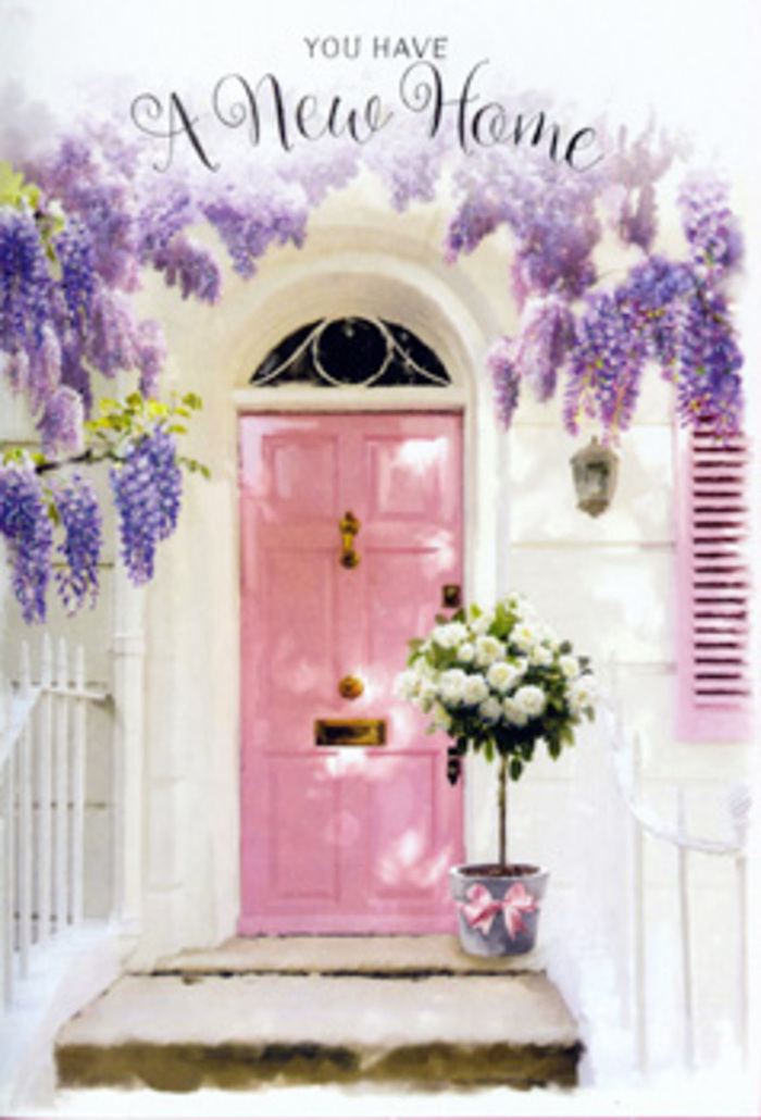 This De Beauvoir Town doorway feels like the opening line of a new story, softly framed by cascading wisteria in shades of lavender and dusky lilac that hang in gentle clusters along the whitewashed wall. The blossoms drape lazily above a delicately painted pink front door, whose colour sits somewhere between rose and blush, glowing even in the filtered North London light. A matching shutter, brushed in a slightly lighter pink, is set to the side, its simple slats catching the glow of the afternoon as if they've been painted just in time for moving day. At the base of the door, resting on a slightly worn stone step, a florist's metal bucket in soft grey is filled to overflowing with creamy white roses, their rounded, velvety heads pressed together in lush abundance. Sprigs of fresh green foliage are threaded throughout the arrangement, giving it a relaxed, garden-inspired feel, as though the flowers might have been gathered from one of De Beauvoir's hidden back gardens. Around the bucket, a pale pink satin ribbon is tied in a neat bow, the trailing ends curling against the metal like a quiet nod to celebration. Dappled light falls through the pendulous wisteria, scattering soft shadows over the roses and step, creating a dreamy, almost painterly effect. The atmosphere is peaceful yet charged with anticipation-the kind of scene that might greet someone returning from a first walk around nearby De Beauvoir Crescent, keys in hand and heart full. It is easy to imagine this arrangement being used to say, Welcome home; may this place be filled with laughter, long conversations, and the gentle comfort of flowers always within reach.