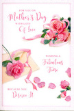 The Mother's Day card in this image looks like a little floral vignette laid out on a calm De Beauvoir Town kitchen table, ready to accompany a freshly delivered bouquet. Its artwork features a generous arrangement of pink roses painted in nuanced shades, from whisper-soft blush at the outer petals to a more saturated pink in the heart of each bloom. The roses sit against a clean, pale background that makes their colour glow, the soft interplay of light and shadow giving them the impression of genuine, velvety texture. Around the central cluster, a few petals appear to have gently drifted down, resting in a loose scatter that feels spontaneous and romantic, like roses shedding softly during a quiet afternoon by the canal. Fine green leaves peek out between the blossoms, adding freshness and contrast without overpowering the gentle pink focus. Flowing script, hand-lettered in a curving, graceful style, offers a warm Mother's Day message that seems to glide alongside the petals, echoing the movement of a florist's hand tying ribbon around a bouquet. The light in the image is soft and diffuse, with no harsh contrasts-just a soothing glow that recalls spring sunshine falling through townhouse windows off De Beauvoir Crescent. Overall, the card radiates affection and appreciation, capturing the sense of calm, thoughtful celebration that comes with surprising a mother in N1 with flowers and a handwritten note, honouring both everyday kindness and long-cherished memories.